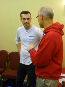 Jesuit Volunteer Josh Smith (at CJI and Seeds of Hope) in conversation with John Meehan.