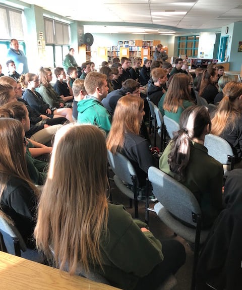 Students listen to Fr Lalit Tirkey SJ at John's High School, Perth, Ontario. (Photo: CJI)